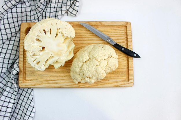 Fresh organic cauliflower. Vegetarian recipe or menu background with copy space