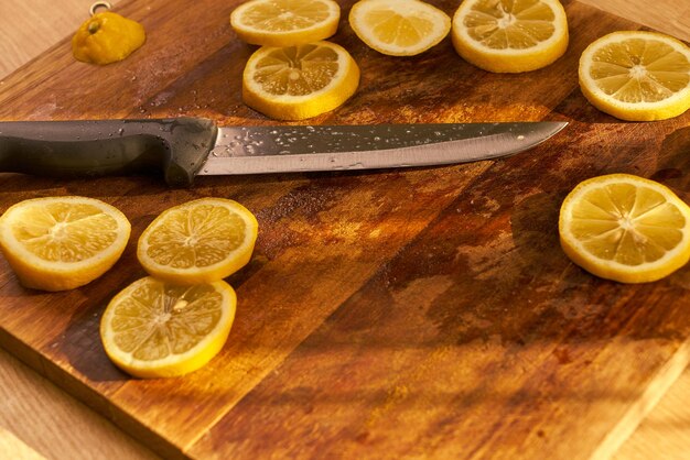 Fresh organic lemons on a wooden cutting board Lemon bannerLemonade banner