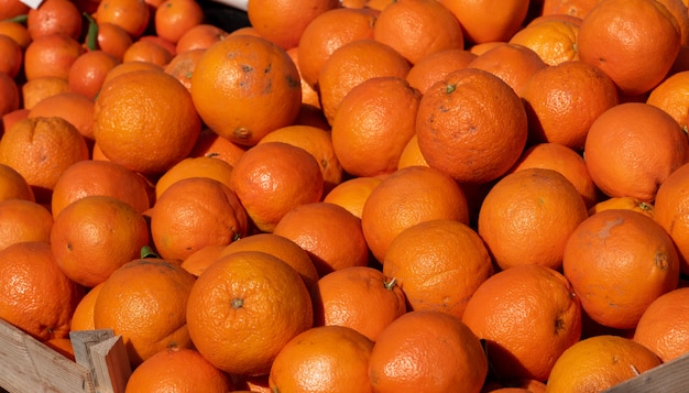 Fresh organic oranges on the market place