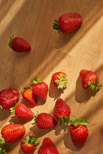 Fresh organic strawberries on a wooden cutting board Strawberry banner