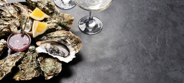 Fresh oysters with glasses of sparkling wine