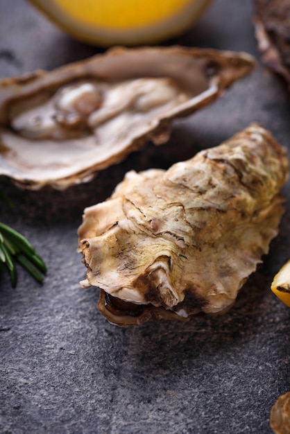 Fresh oysters with lemon and rosemary