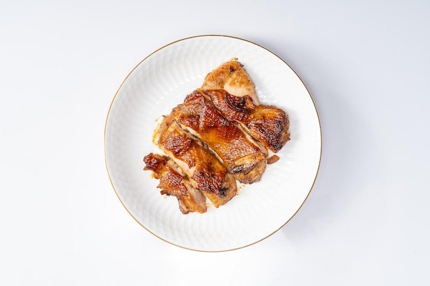 Fresh pan-fried chicken chops on a monochrome background