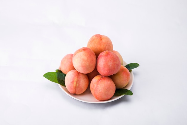 Fresh peach on a  basket