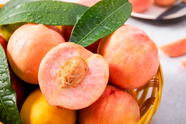 Fresh peach on a  basket