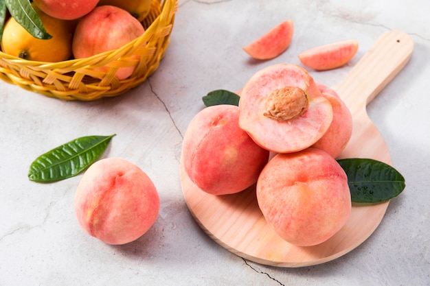 Fresh peach on a  basket