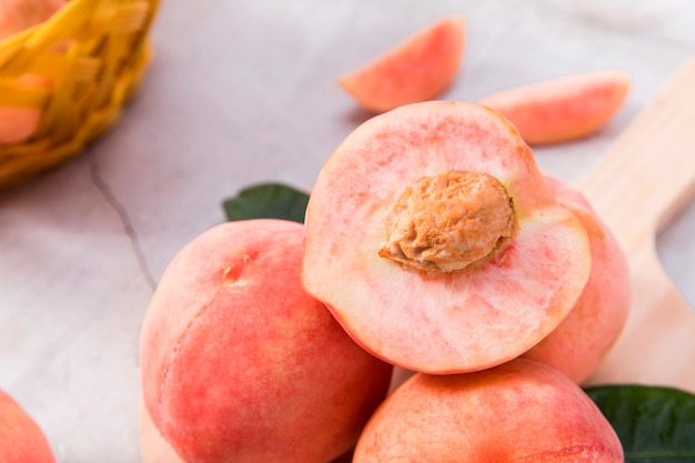 Fresh peach on a  basket