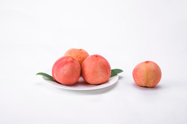 Fresh peach on a  basket