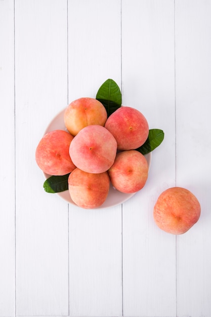 Fresh peach on a  basket