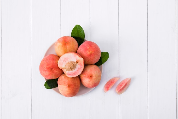 Fresh peach on a  basket