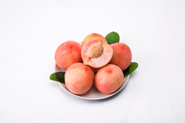 Fresh peach on a  basket