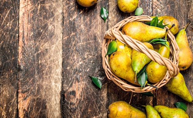 Fresh pears in the basket.