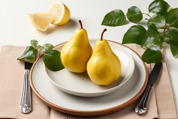 Photo fresh pears on a white plate with fork and knife