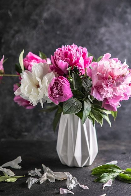 Fresh Peony flowers in vase bouquet close up Stylish floral greeting card