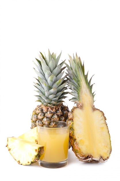 Fresh pineapple juice in the glass with pineapple isolated on white