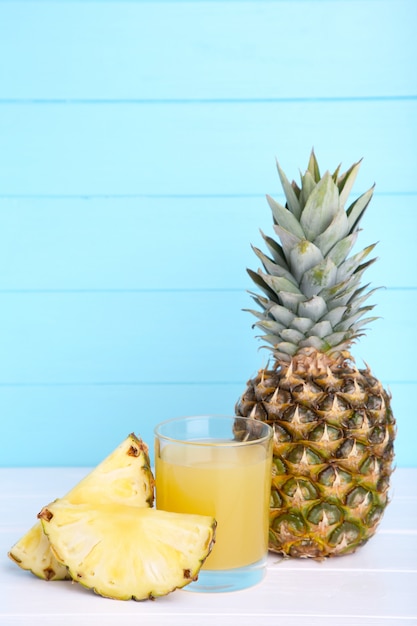 Fresh pineapple juice in the glass with pineapple