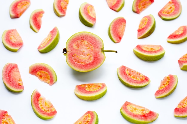 Fresh pink guava on white background.