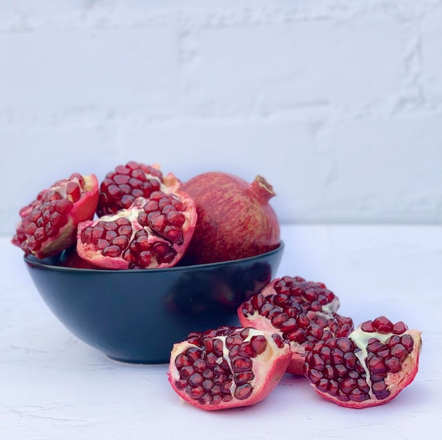 fresh pomegranate close-up. space for text. fresh fruits.