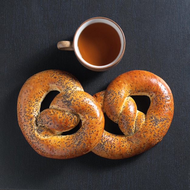 Fresh poppy pretzels and tea