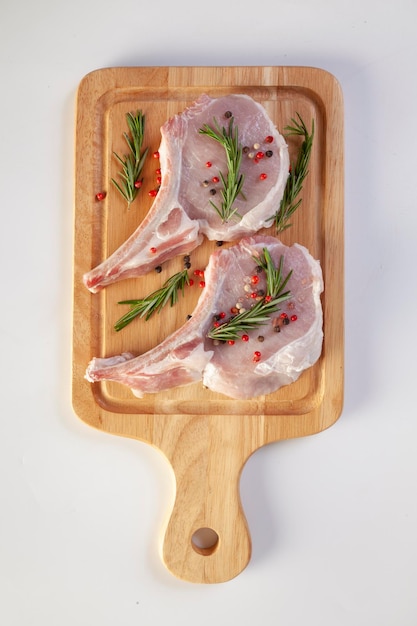 Fresh pork chop on white background