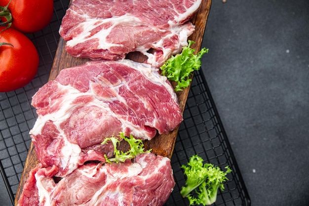 fresh pork raw meat meal food snack on the table copy space food background rustic top view