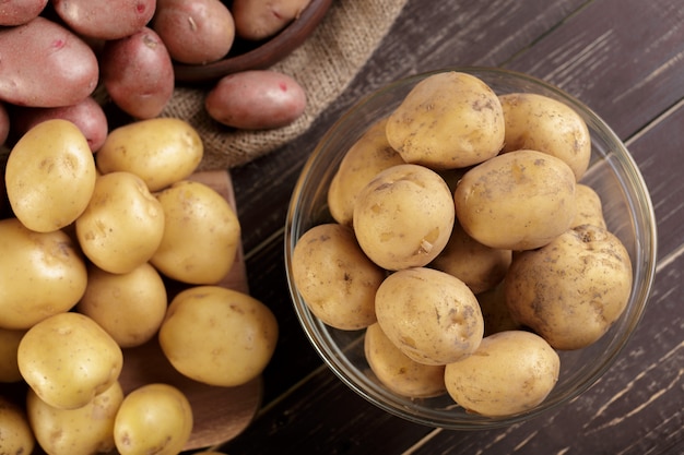 Fresh potatoes on the wood