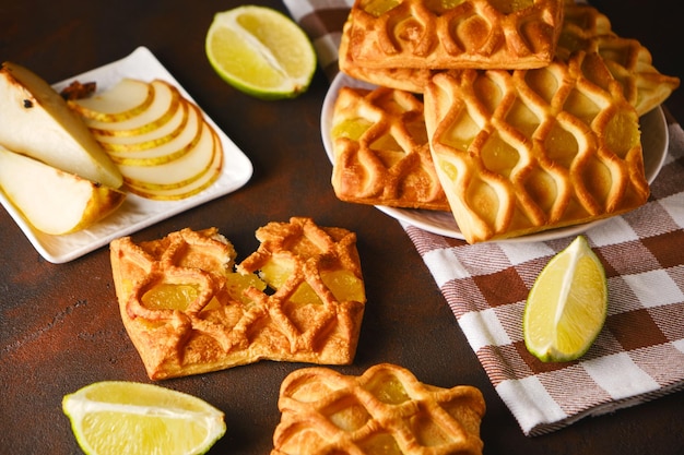 Fresh puff pastry mini pies with pear and lime jam