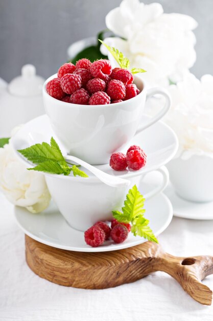 Fresh raspberries in stacked cups