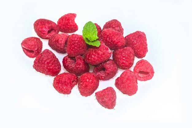 Fresh raspberries on white background