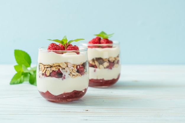 Fresh raspberry and yogurt with granola