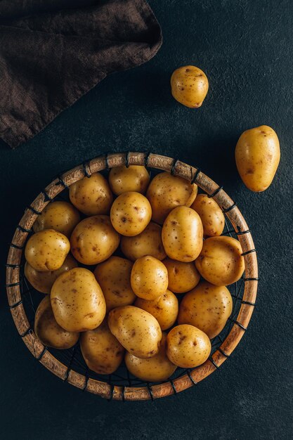 Fresh raw baby potato in a basket