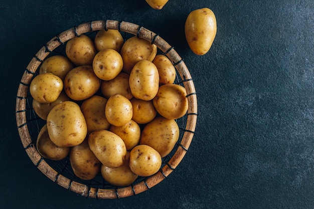 Fresh raw baby potato in a basket