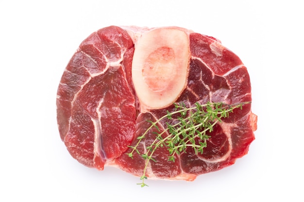 Fresh raw bio  beef steak isolated on white surface.