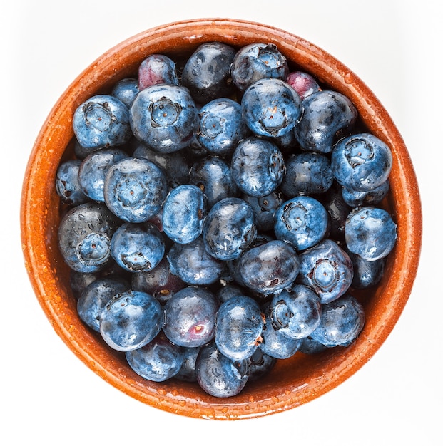 Fresh and raw blueberries with drops of water