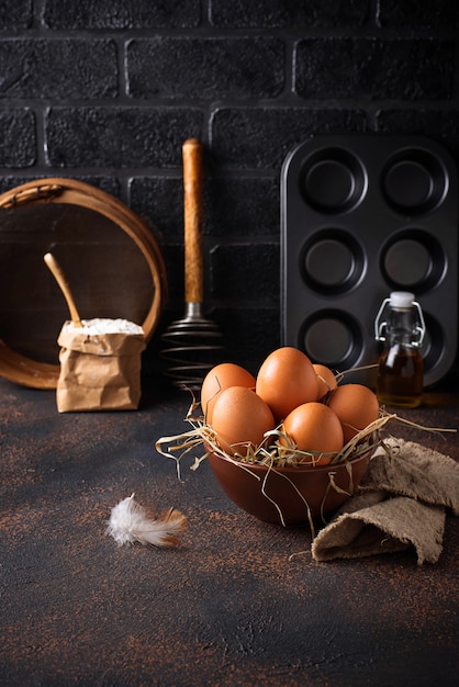 Fresh raw brown eggs in bowl