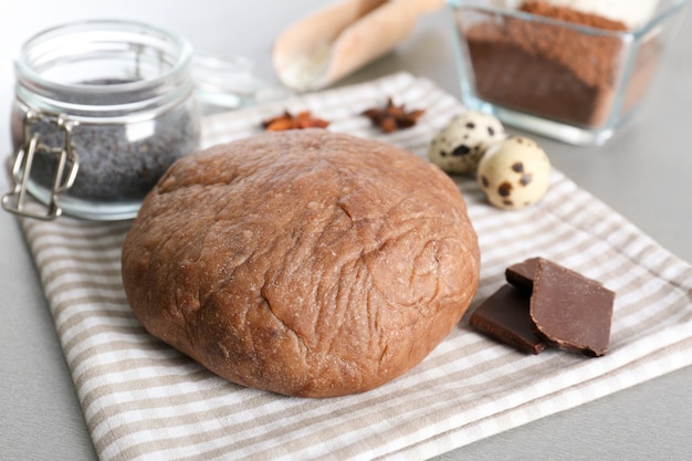 Fresh raw dough on table