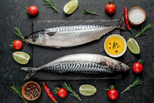 Fresh raw mackerel fish on stone background