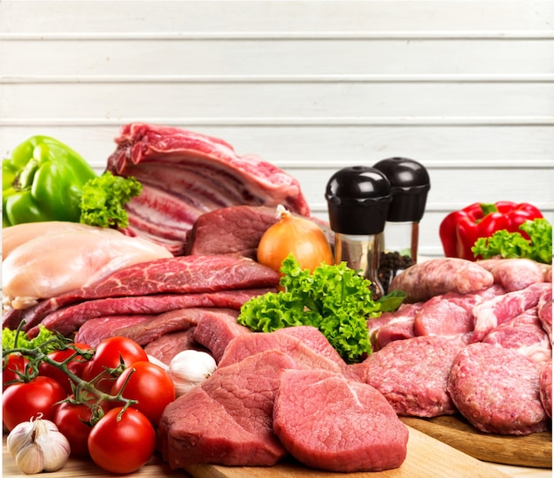 Fresh Raw Meat Background with vegetables