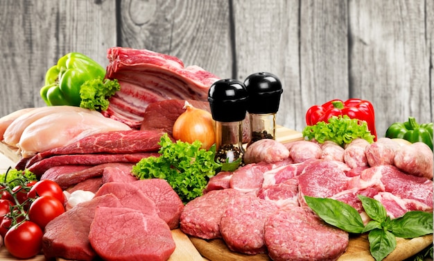 Fresh Raw Meat Background with vegetables