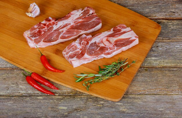 Fresh raw steak with rosemary and hot chilli paper