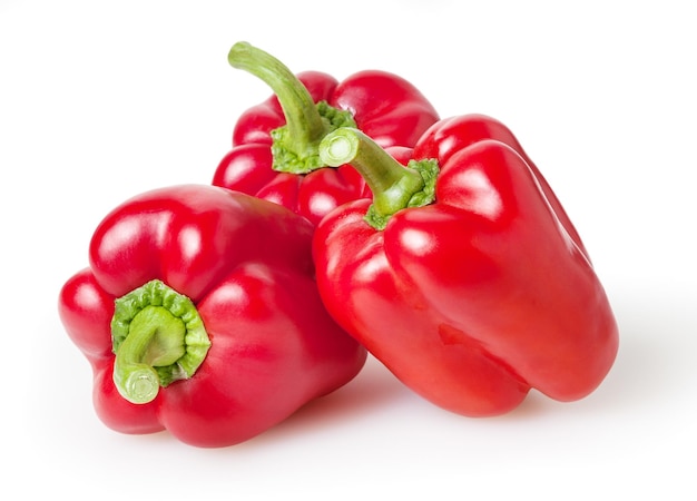 Fresh red bell peppers isolated on white background with clipping path