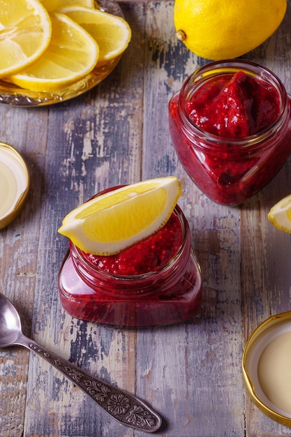 Fresh red berry smoothie on a board. 