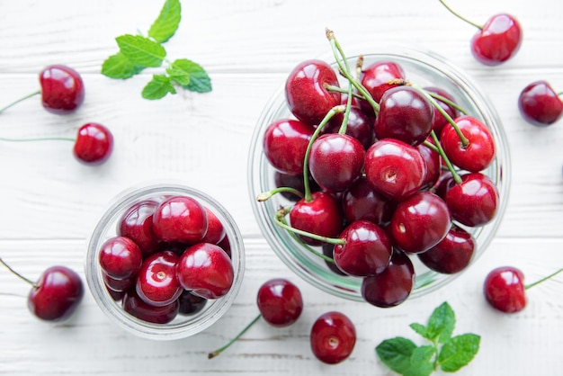 Fresh red cherries fruit in jars