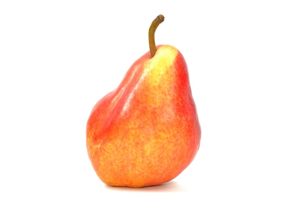 Fresh red pear on a white background close up