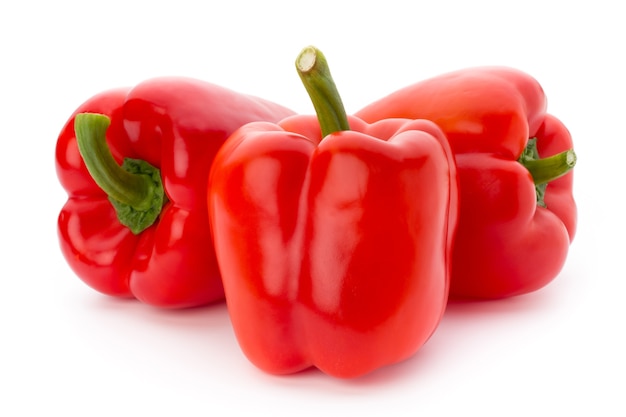 Fresh red pepper on white surface, isolated.