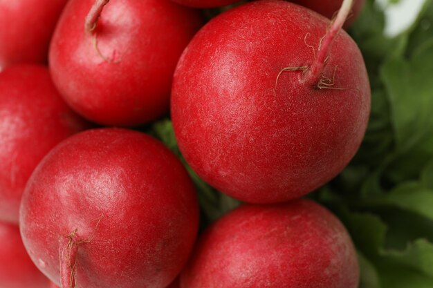 Fresh red radish on whole surface, close up