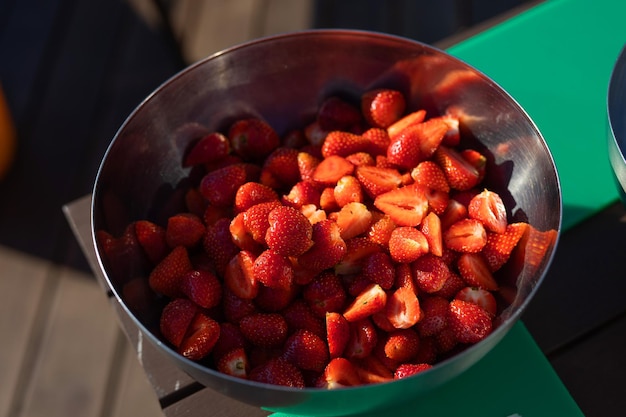 fresh red ripe strawberries in a bowl