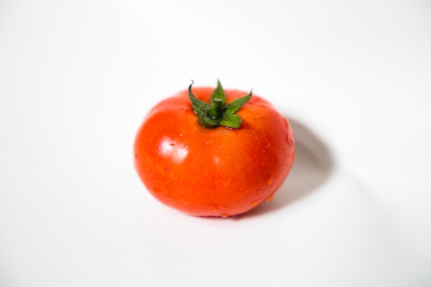 Fresh Red Ripe Tomato Isolated On Background Natural Raw organic healthy vegetable Salad