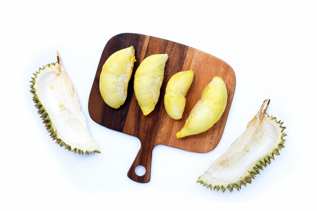 Fresh ripe cut durian on white background.