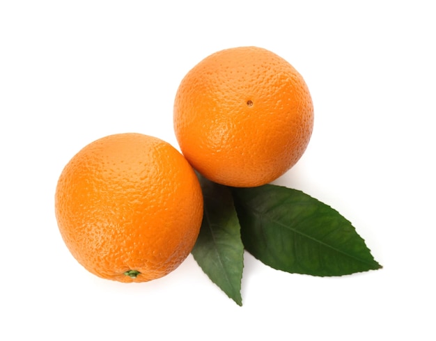 Fresh ripe oranges with green leaves on white background top view